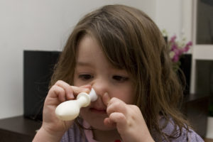 otovent (1 of 1) Use of the otovent device. A nozzle is placed into one nostril while the other is occluded. Then an attempt is made to inflate the balloon, which provides a safe level of resistance. Most 3-4 year olds can use this device.